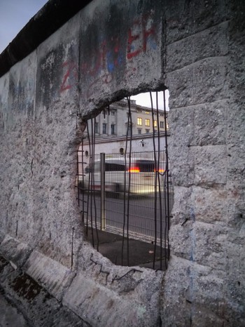 Hole smashed in a preserved part of the Berlin Wall
