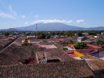 Colonial houses in front of a volcano
