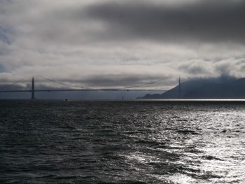 Golden Gate bridge being covered by Karl the fog
