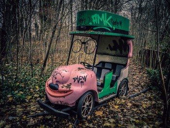 Abandoned Hitler moustace car, slightly off the rails