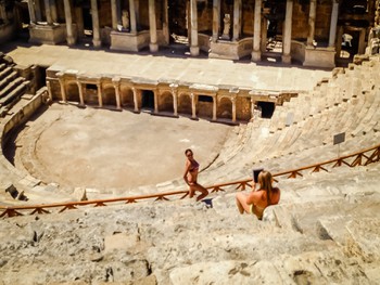 It's not every day you see girls in bikini's posing in roman ruins for their friend with an iPad