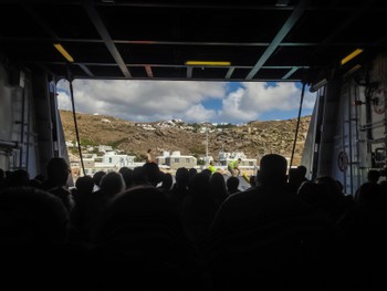 People about to charge off the ferry onto Mykonos