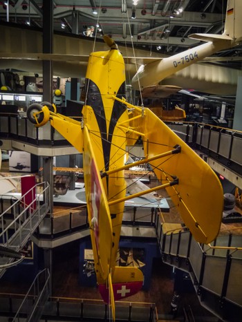 This musuem had so many planes they needed to mount this one vertically