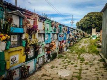 Colourful graves stacked four high