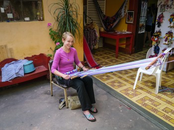 Rachel working a backstrap loom