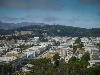 Golden Gate poking over the hills