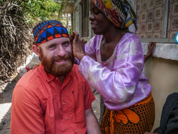 Me getting some beard braids